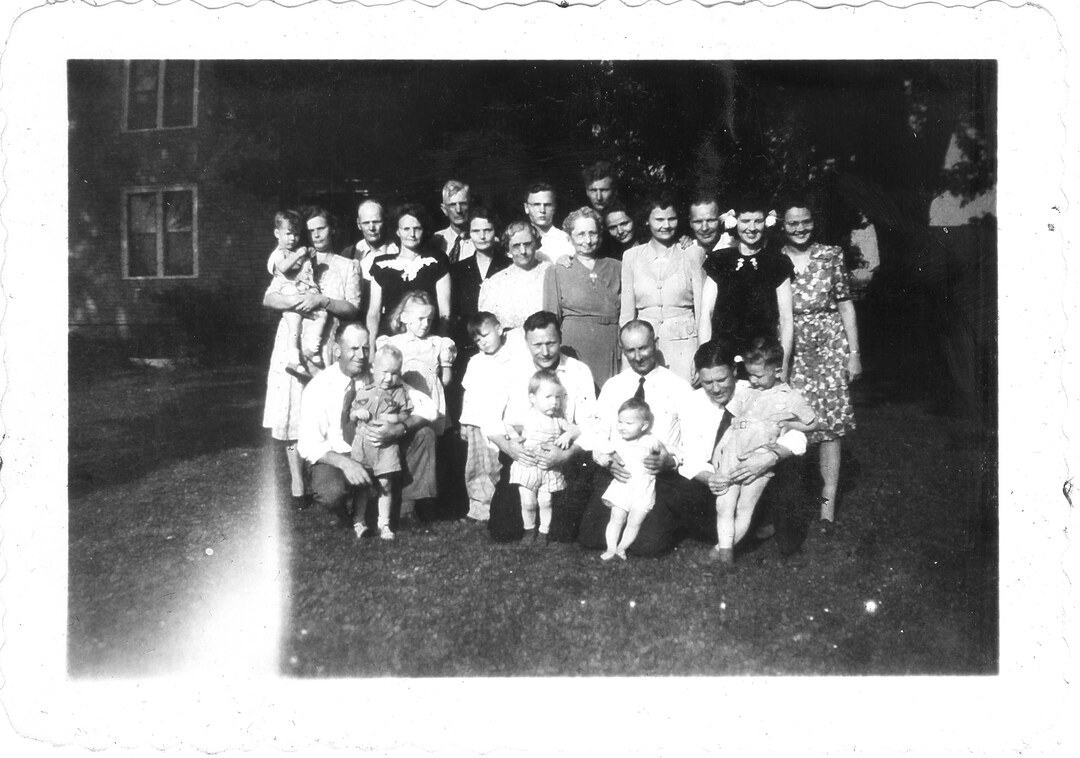 Photograph (108)
1946, Windsor, Wis.  Heide-McNall extended family at Berths's funeral.  All of the Webster McNall famil plus Aunt Elizabeth, Aunt Millie, Uncle Roy Heide.
