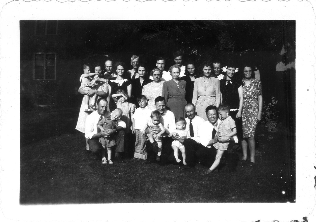 Photograph (109)
1946, Windsor, Wis.  Heide-McNall extended family at Berths's funeral.  All of the Webster McNall famil plus Aunt Elizabeth, Aunt Millie, Uncle Roy Heide.

