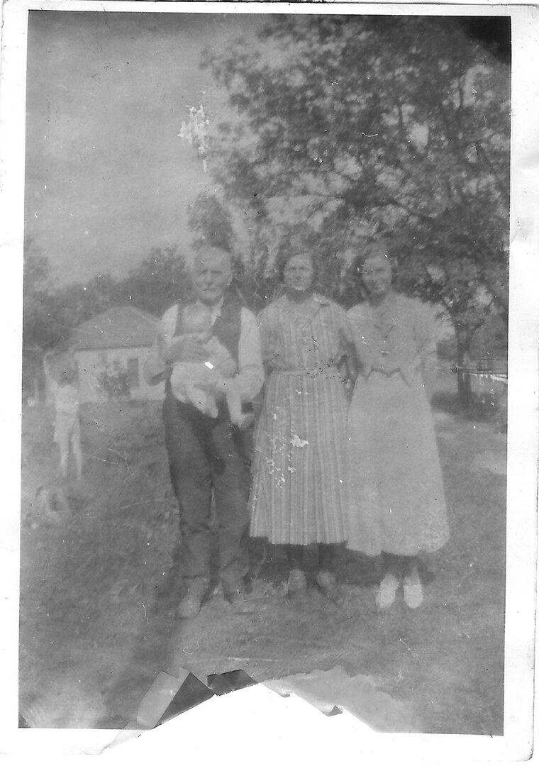 Photograph (141)
1934, Kansas.  Granddad G. O. Heide.  The woman in the middle looks like Bertha.
